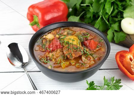 Georgian Or Armenian Meat Khashlama With Vegetables And On A White Background. Selective Focus.