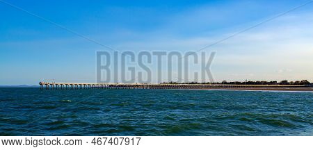 Out 868 Metres Into The Ocean, The Historic Urangan Pier In Hervey Bay, Australia, Is Today A Great 
