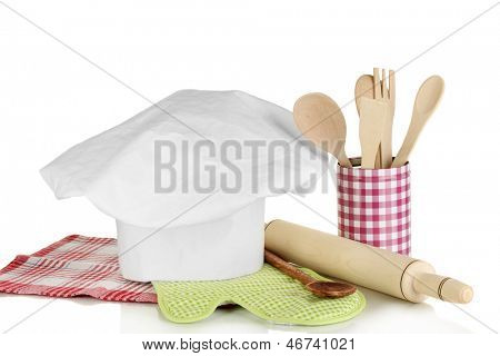 Kochmütze mit Löffel und Federballschläger, isolated on white