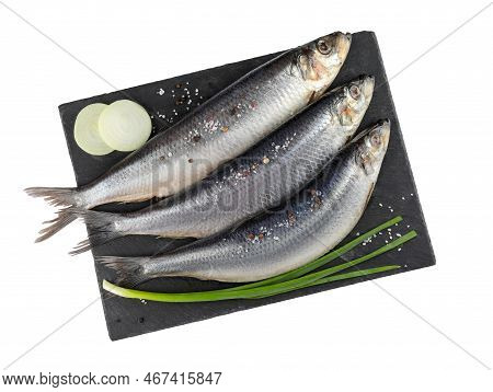 Slate Plate With Salted Herrings, Spices And Onion Isolated On White, Top View