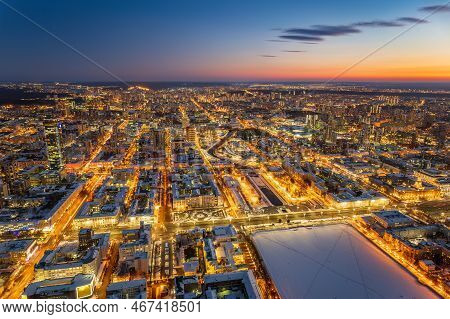 Embankment Of The Central Pond And Plotinka In Yekaterinburg At Winter Sunset. The Historic Center O