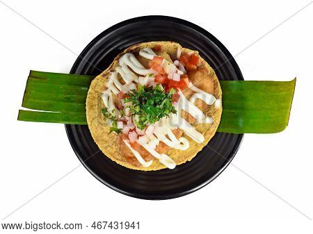 Taco Condesa With Fried Fish On Black Plate Isolated On White Background Site View