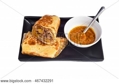 Mexican Burrito With Beef, Cheese, Potato Served With Sauce Borracha