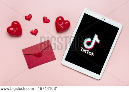 Bangkok, Thailand December 2022 Smartphone Tik Tok Application Icon, Logo On Screen, Like, Two Red H