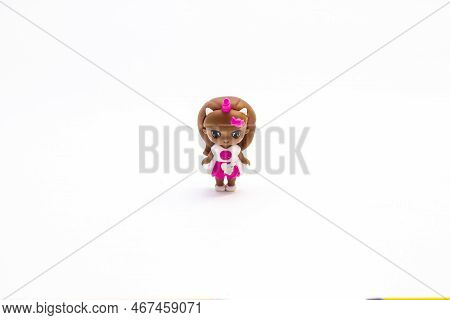 Doll Black, African American, Negroid Girl On A White Background, Isolated Object