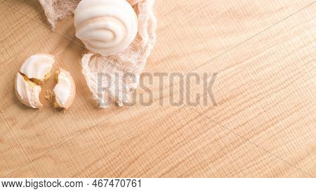 Coockies With Egg White Cover. Portuguese Sweets Known As Cavacas Served With Tea On Ceramic Cups.