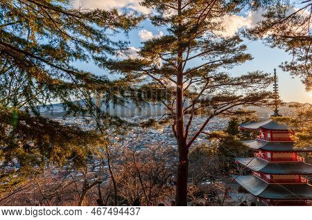 The Last Rays Of The Setting Sun Illuminating Mount Fuji And The Churito Pagode On A December Winter