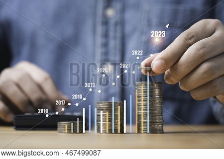 Businessman Stacking Money Coins With Up Arrow And Percentage Symbol For Financial Banking Increase 