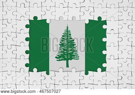 Norfolk Island Flag In Frame Of White Puzzle Pieces With Missing Central Parts