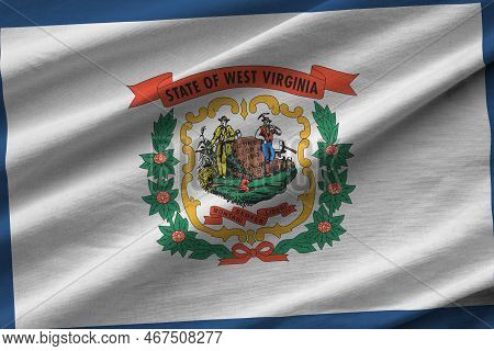 West Virginia Us State Flag With Big Folds Waving Close Up Under The Studio Light Indoors. The Offic