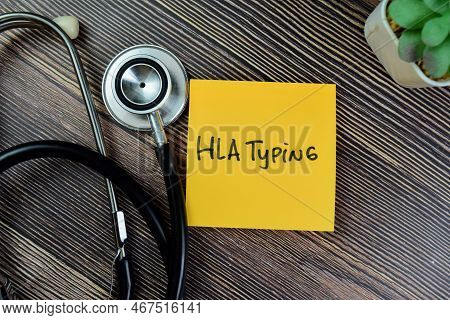 Concept Of Hla Typing Write On Sticky Notes Isolated On Wooden Table.