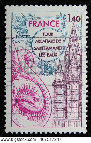 Istanbul, Turkey - December 25, 2020: French Stamp Shows Abbey Tower, Saint-amandles-eaux Circa 1977