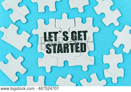 Medical Concept. On A Blue Background Are White Puzzles With The Inscription - Let Is Get Started