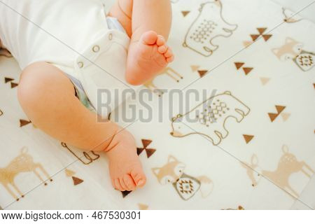 Plymouth, Michigan / United States - February 21 2019: One Month Old Child Lies On A Blanketed Chang