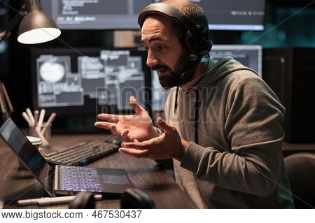 Male Programmer Talking On Videocall Teleconference, Using Online Videoconference Call And Webcam On