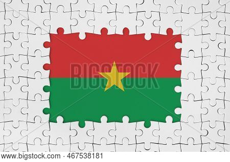 Burkina Faso Flag In Frame Of White Puzzle Pieces With Missing Central Parts