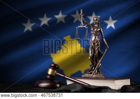 Kosovo Flag With Statue Of Lady Justice, Constitution And Judge Hammer On Black Drapery. Concept Of 