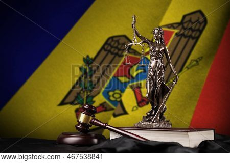 Moldova Flag With Statue Of Lady Justice, Constitution And Judge Hammer On Black Drapery. Concept Of