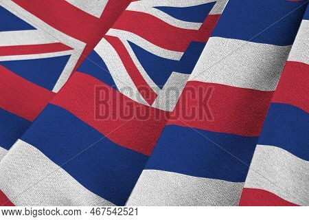 Hawaii Us State Flag With Big Folds Waving Close Up Under The Studio Light Indoors. The Official Sym