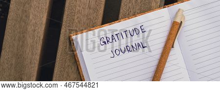Writing Gratitude Journal On Wooden Bench. Today I Am Grateful For. Self Discovery Journal, Self Ref