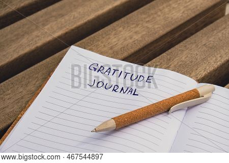 Writing Gratitude Journal On Wooden Bench. Today I Am Grateful For. Self Discovery Journal, Self Ref