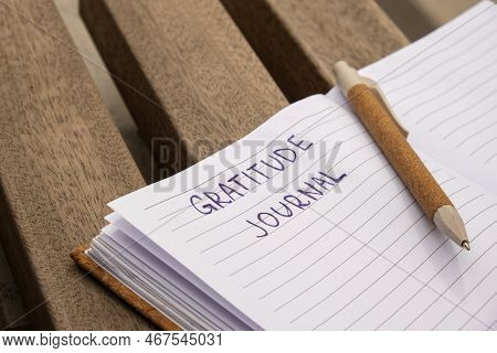 Writing Gratitude Journal On Wooden Bench. Today I Am Grateful For. Self Discovery Journal, Self Ref