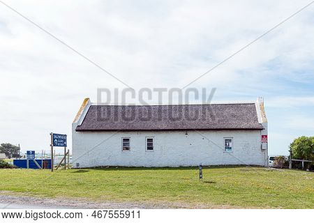Struisbaai, South Africa - Sep 21, 2022: Street Scene, With The Small Town Meat Deli, In Struisbaai,