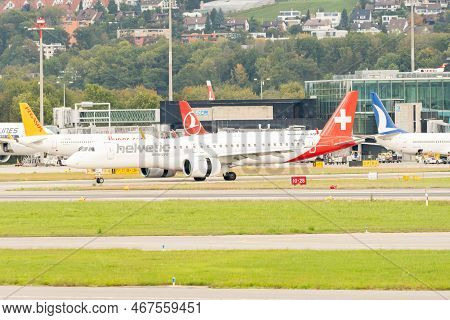 Zurich, Switzerland, September 27, 2022 Helvetic Airways Embraer E195-e2 Aircraft Is Taxiing To Its 