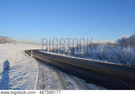 Country Road Curve In A Sunny Winter Wonderland