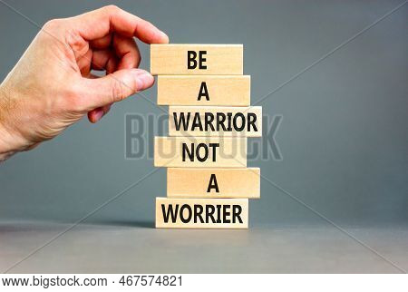 Warrior Or Worrier Symbol. Concept Words Be A Warrior Not A Worrier On Wooden Blocks On A Beautiful 