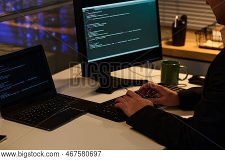 Close-up Of Programmer Developing Computer Program With Codes On Computer While Working In Office Ti