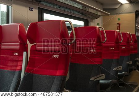 Red Passenger Seats On The Obb Train; Austria, Vienna, November 3, 2022.