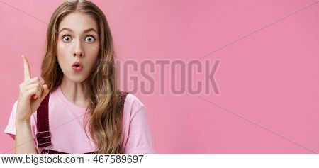 Close-up Shot Of Creative Emotive Young Cute Female Student With Beautiful Natural Wavy Hair Raising