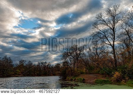 The Dupage River Flows Through Hammel Woods Forest Preserve In Will County, Illinois Inder A Sky Of 