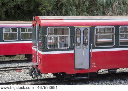Alishan, Taiwan- 7 Dec, 2022: Red Train Stop At Alishan Station In Alishan National Scenic Area Taiw