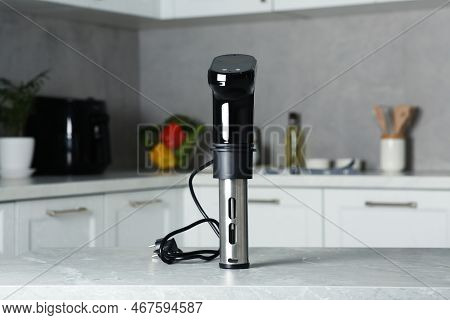 Thermal Immersion Circulator On Table In Kitchen. Sous Vide Cooking