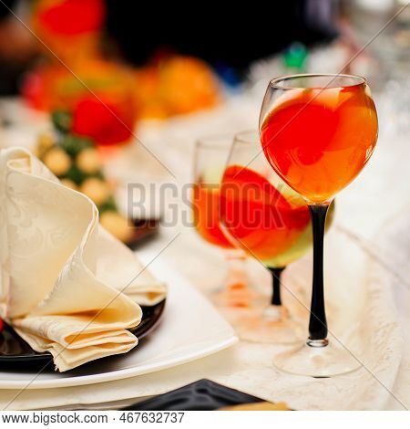 Glasses Of Cocktails On The Christmas Table.