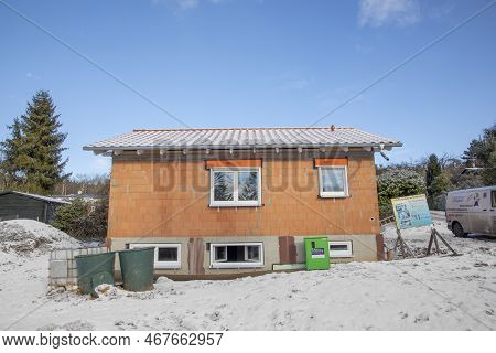 Fischbach, Germany- February 11, 2021: Construction Of A New Built House In Winter Landscape.