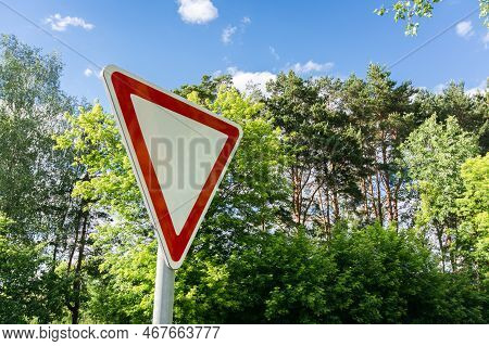 Give Way Sign On A Beautiful Background