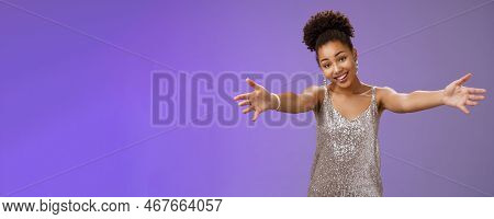 Lovely Touched African-american Female In Evening Slver Dress Extend Arms Hug Give Cuddle Tilt Head 
