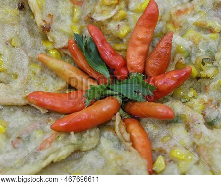 Red Chilies Are Arranged As A Garnish, As A Spicy Addition To Bakwan Or Bala-bala Dishes.