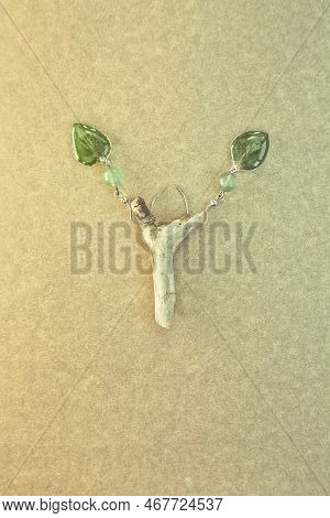 Close Up Original Earrings With Green Leaves And Beads Concept Photo. Top View Photography With Plyw