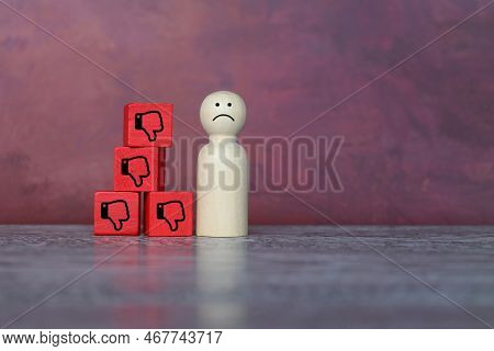 Sad Wooden Doll And Thumbs Down Icon. Rejection, Refusal, Turn Down And Decline Concept