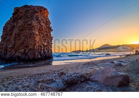 Colorful Sunset On Fyriplaka Beach, Milos, Greece. No People, Low Sun. Iconic Fyriplaka Lonely Rock 