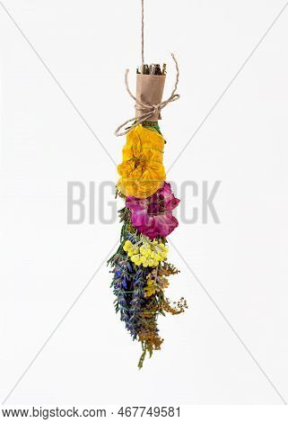 Smudge Stick To Banish Bad Energy. Dried Herbs Bound In Bundles And Hung On The Rope. Homemade Incen