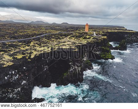 Spectacular View Of Svortuloft Lighthouse On The Cliff By The Sea