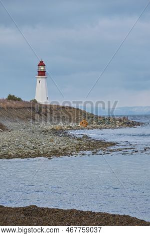 The Low Point Lighthouse Is At The Entrance To Sydney Harbour Near New Victoria Cape Breton Island N