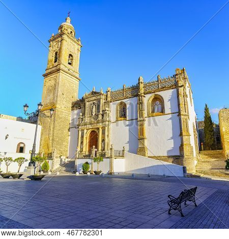 Main Square With Medieval Stone Church In The Picturesque Town Of Medina Sidonia, Cadiz.