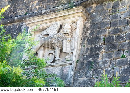 Marble Bas-relief With Venetian Lion On The City Wall Of Kotor, Montenegro. It Is Located On Outer W