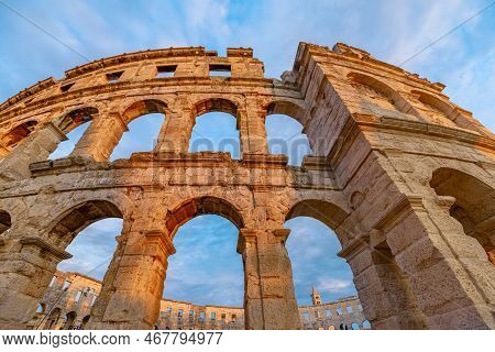 Pula Amphitheater At Sunset, Also Known As Coliseum Of Pula, Is A Well-preserved Roman Amphitheater 
